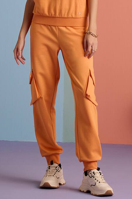 Muvazo_Orange Cotton, Polyester Halter Neck Zest Solid Hoodie Top And Joggers Set _Online_at_Aza_Fashions
