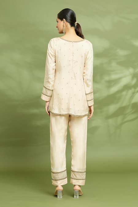 Shop Enamour By Radha Ivory Organza, Silk Sequins, Zari V-neck Embroidered Tunic Pant Set at Aza Fashions Shop_Enamour By Radha_Ivory Organza, Silk Sequins, Zari V-neck Embroidered Tunic Pant Set _at_Aza_Fashions