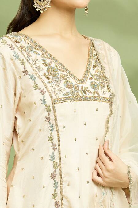 Buy Enamour By Radha Ivory Organza, Silk Sequins, Zari V-neck Embroidered Tunic Pant Set Online at Aza Fashions Buy_Enamour By Radha_Ivory Organza, Silk Sequins, Zari V-neck Embroidered Tunic Pant Set _Online_at_Aza_Fashions