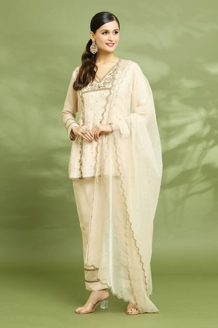 Enamour By Radha Ivory Organza, Silk Sequins, Zari V-neck Embroidered Tunic Pant Set at Aza Fashions Enamour By Radha_Ivory Organza, Silk Sequins, Zari V-neck Embroidered Tunic Pant Set _at_Aza_Fashions