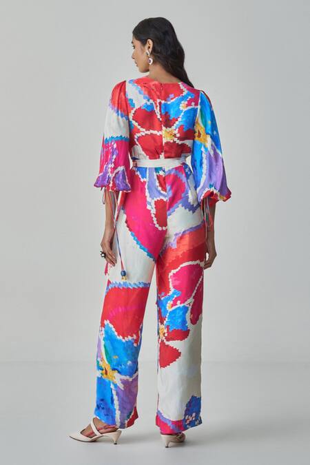 Shop Saaksha & Kinni Pink Silk Embroidery V-neck Jenny Ikat Print Jumpsuit With Belt at Aza Fashions Shop_Saaksha & Kinni_Pink Silk Embroidery V-neck Jenny Ikat Print Jumpsuit With Belt_at_Aza_Fashions