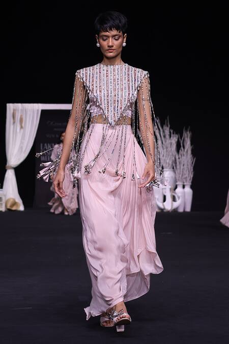 Sejal Kamdar Pink Ajrakh Striped Capelet Jacket And Dhoti Skirt Set at Aza Fashions Sejal Kamdar_Pink Ajrakh Striped Capelet Jacket And Dhoti Skirt Set _at_Aza_Fashions