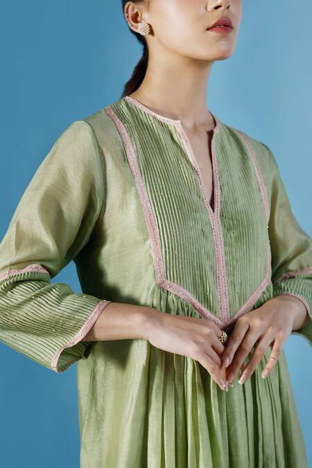 Chokhi Chorri Green Silk, Chanderi Pearls Split V-neck Alena Pintucked Yoke Dress With Inner Online at Aza Fashions Chokhi Chorri_Green Silk, Chanderi Pearls Split V-neck Alena Pintucked Yoke Dress With Inner _Online_at_Aza_Fashions