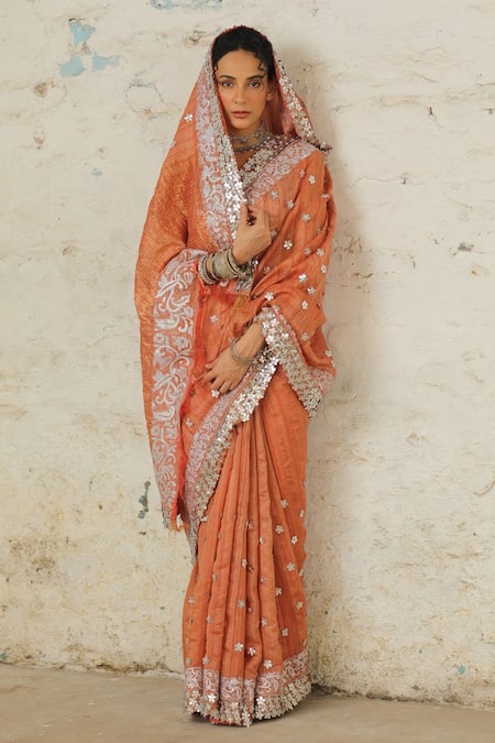 Saksham & Neharicka Orange Tussar Applique Copper Embroidered Saree With Unstitched Blouse Piece at Aza Fashions Saksham & Neharicka_Orange Tussar Applique Copper Embroidered Saree With Unstitched Blouse Piece _at_Aza_Fashions