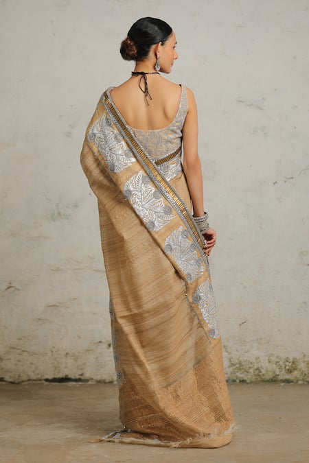 Shop Saksham & Neharicka Beige Tussar Gota Patti, Mahalaya Embroidered Saree With Unstitched Blouse Piece at Aza Fashions Shop_Saksham & Neharicka_Beige Tussar Gota Patti, Mahalaya Embroidered Saree With Unstitched Blouse Piece _at_Aza_Fashions