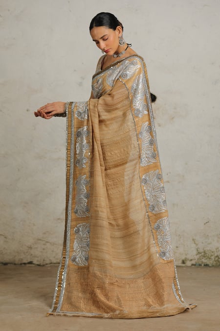 Buy Saksham & Neharicka Beige Tussar Gota Patti, Mahalaya Embroidered Saree With Unstitched Blouse Piece Online at Aza Fashions Buy_Saksham & Neharicka_Beige Tussar Gota Patti, Mahalaya Embroidered Saree With Unstitched Blouse Piece _Online_at_Aza_Fashions