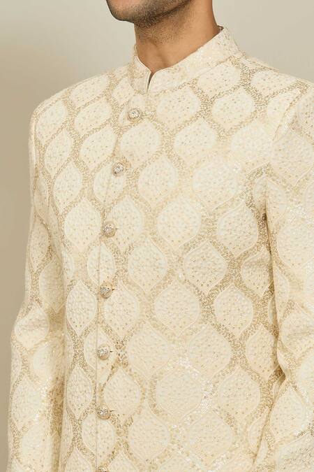 Shop Arihant Rai Sinha Cream Georgette, Polyester, Cotton Mughal Ogee Pattern Sherwani With Churidar Online at Aza Fashions Shop_Arihant Rai Sinha_Cream Georgette, Polyester, Cotton Mughal Ogee Pattern Sherwani With Churidar_Online_at_Aza_Fashions