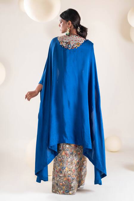 Shop Pallavi Poddar Blue Silk Tassels High Neck Phool Resham Suta Work Cape Draped Skirt Set at Aza Fashions Shop_Pallavi Poddar_Blue Silk Tassels High Neck Phool Resham Suta Work Cape Draped Skirt Set _at_Aza_Fashions