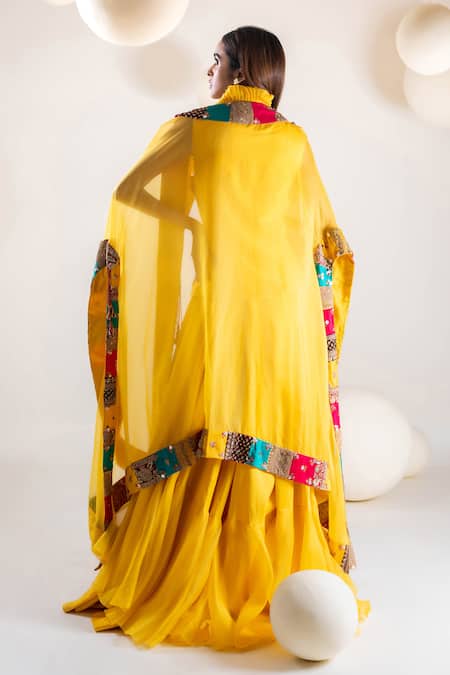 Shop Pallavi Poddar Yellow Organza Sequins, Zari, Embroidery V-neck Patch Work Waistcoat Skirt Set at Aza Fashions Shop_Pallavi Poddar_Yellow Organza Sequins, Zari, Embroidery V-neck Patch Work Waistcoat Skirt Set _at_Aza_Fashions