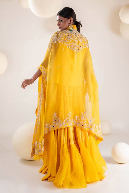 Shop Pallavi Poddar Yellow Organza, Denim Embroidery V-neck Floral Cape Layered Skirt Set at Aza Fashions Shop_Pallavi Poddar_Yellow Organza, Denim Embroidery V-neck Floral Cape Layered Skirt Set _at_Aza_Fashions