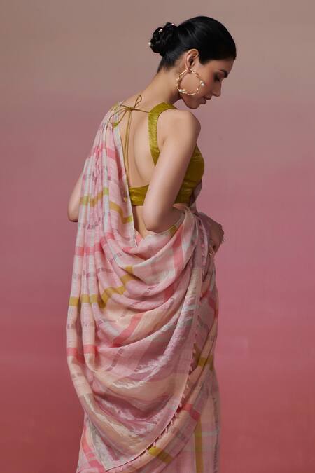 Shop Dressfolk Peach Handloom Cotton Color Block Stripe Linen Saree With Running Blouse at Aza Fashions Shop_Dressfolk_Peach Handloom Cotton Color Block Stripe Linen Saree With Running Blouse_at_Aza_Fashions