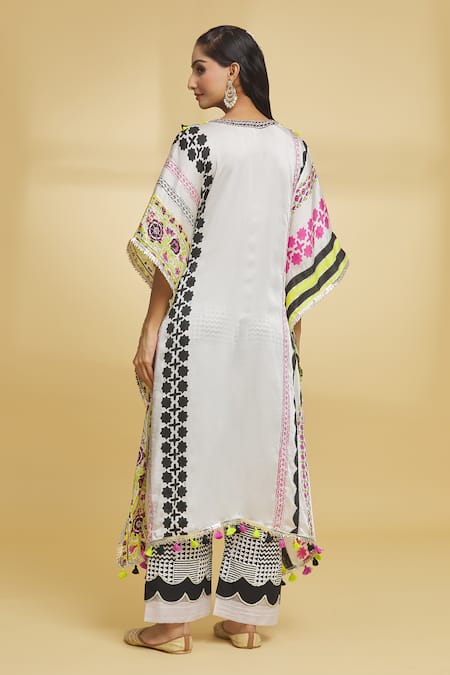 Shop Maayera Jaipur White Muslin, Cotton Tassels V-neck Floral Pattern Kaftan And Pant Set at Aza Fashions Shop_Maayera Jaipur_White Muslin, Cotton Tassels V-neck Floral Pattern Kaftan And Pant Set _at_Aza_Fashions