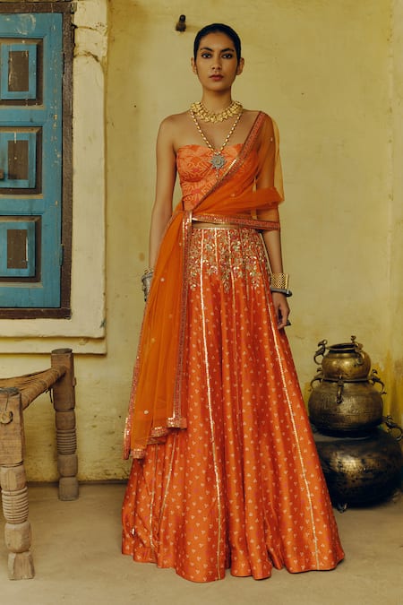 Drishti & Zahabia Orange Dupion Silk Print Bandhani Aari Bandhej Phool Lehenga Set 