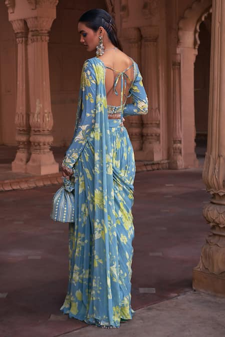 Shop Diyarajvvir Blue Crepe, Georgette Sequins, Floral Pattern Pre-draped Skirt Saree With Blouse at Aza Fashions Shop_Diyarajvvir_Blue Crepe, Georgette Sequins, Floral Pattern Pre-draped Skirt Saree With Blouse _at_Aza_Fashions