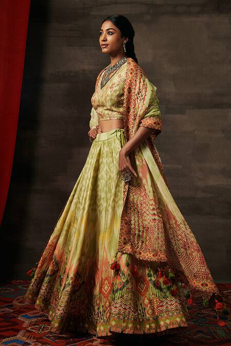 Buy Saundh Green Silk, Organza, Cotton Embroidery, Zari, Lila Tribal Print Lehenga Set Online at Aza Fashions Buy_Saundh_Green Silk, Organza, Cotton Embroidery, Zari, Lila Tribal Print Lehenga Set _Online_at_Aza_Fashions