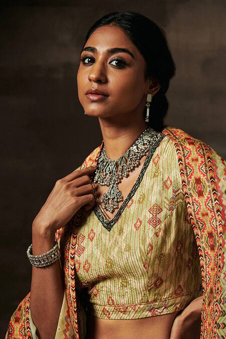 Saundh Green Silk, Organza, Cotton Embroidery, Zari, Lila Tribal Print Lehenga Set at Aza Fashions Saundh_Green Silk, Organza, Cotton Embroidery, Zari, Lila Tribal Print Lehenga Set _at_Aza_Fashions