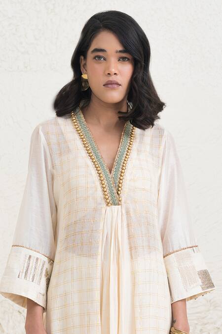 Buy Rishi and Vibhuti Ivory Chanderi, Crepe Beads, Eraya Neckline Embellished Kurta And Flared Pant Set Online at Aza Fashions Buy_Rishi and Vibhuti_Ivory Chanderi, Crepe Beads, Eraya Neckline Embellished Kurta And Flared Pant Set _Online_at_Aza_Fashions