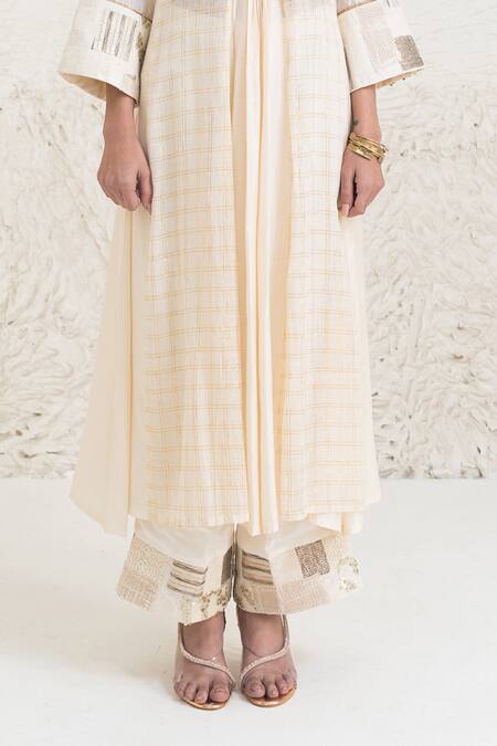 Shop Rishi and Vibhuti Ivory Chanderi, Crepe Beads, Eraya Neckline Embellished Kurta And Flared Pant Set Online at Aza Fashions Shop_Rishi and Vibhuti_Ivory Chanderi, Crepe Beads, Eraya Neckline Embellished Kurta And Flared Pant Set _Online_at_Aza_Fashions
