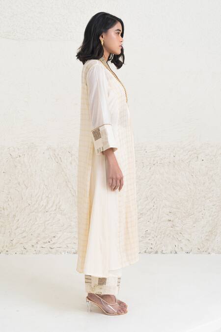 Rishi and Vibhuti Ivory Chanderi, Crepe Beads, Eraya Neckline Embellished Kurta And Flared Pant Set at Aza Fashions Rishi and Vibhuti_Ivory Chanderi, Crepe Beads, Eraya Neckline Embellished Kurta And Flared Pant Set _at_Aza_Fashions