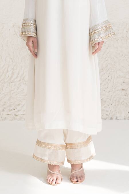 Rishi and Vibhuti_Ivory Organza, Crepe Lace, Inari Sleeve Embroidered Kurta And Flared Pant Set _Online_at_Aza_Fashions