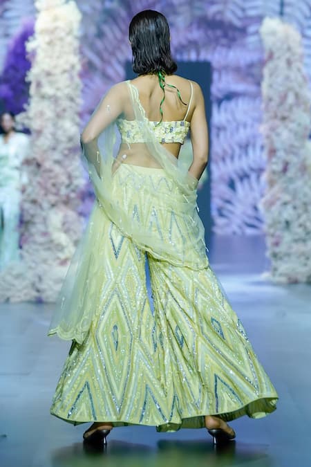 Shop_Nirmooha_Green Crepe Sequins, Beads, Cut Work Geometric Embroidered Flared Pant _at_Aza_Fashions