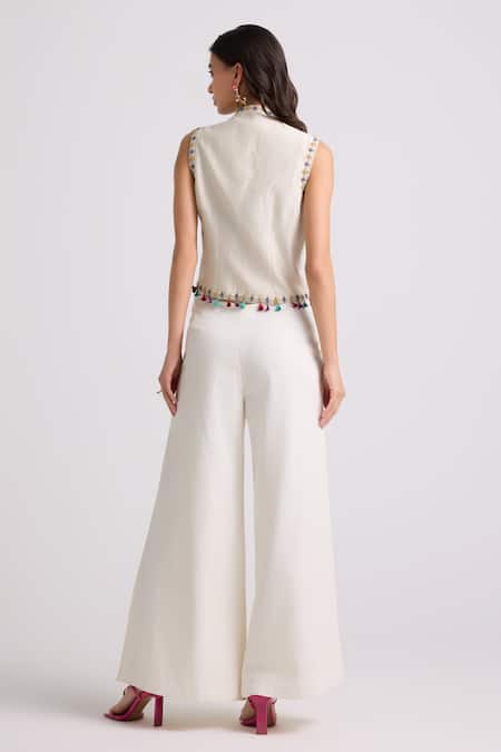 Shop Chandrima Ivory Cotton, Twill Cut Work Flared Pant at Aza Fashions Shop_Chandrima_Ivory Cotton, Twill Cut Work Flared Pant _at_Aza_Fashions