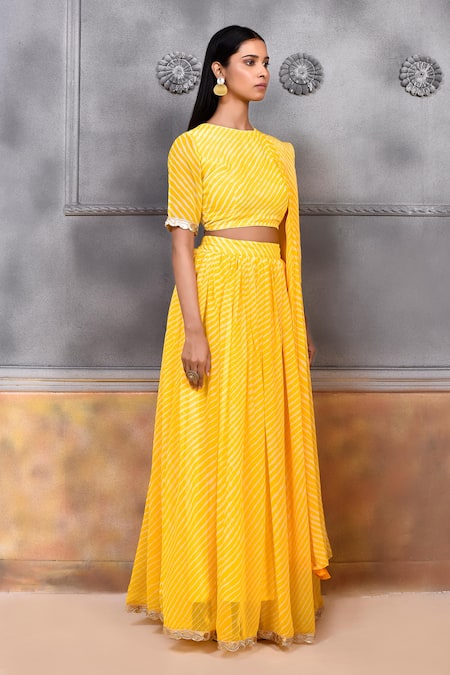 Samyukta Singhania_Yellow Georgette, Cotton Boat Illuminating Leheriya Print Blouse Lehenga Set_at_Aza_Fashions