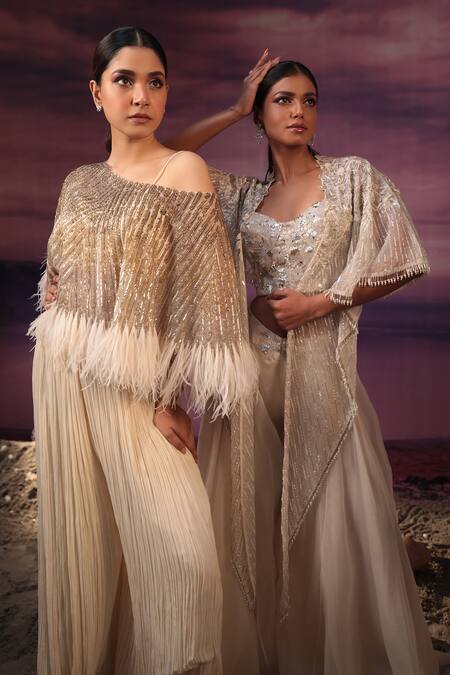 Shop COUTURE BY NIHARIKA Ivory Organza, Crepe, Viscose Feathers, Embroidered Cape With Pleated Pant Set Online at Aza Fashions Shop_COUTURE BY NIHARIKA_Ivory Organza, Crepe, Viscose Feathers, Embroidered Cape With Pleated Pant Set _Online_at_Aza_Fashions