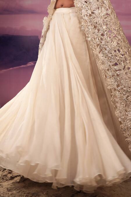 Shop COUTURE BY NIHARIKA Ivory Net Embroidery Sweetheart , Open Floral Jacket With Skirt Set Online at Aza Fashions Shop_COUTURE BY NIHARIKA_Ivory Net Embroidery Sweetheart , Open Floral Jacket With Skirt Set _Online_at_Aza_Fashions