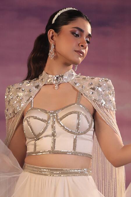 Buy COUTURE BY NIHARIKA Ivory Organza, Net Embroidery, Cut Work Sweetheart Neck Long Cape With Skirt Set Online at Aza Fashions Buy_COUTURE BY NIHARIKA_Ivory Organza, Net Embroidery, Cut Work Sweetheart Neck Long Cape With Skirt Set _Online_at_Aza_Fashions