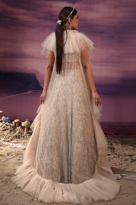 COUTURE BY NIHARIKA Ivory Organza, Net Cut Work, Embroidery Floral Lehenga Set With Ruffle Cape Online at Aza Fashions COUTURE BY NIHARIKA_Ivory Organza, Net Cut Work, Embroidery Floral Lehenga Set With Ruffle Cape _Online_at_Aza_Fashions
