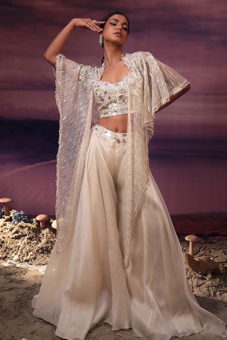 COUTURE BY NIHARIKA Ivory Satin Organza Embroidery Cutdana Cape Open Geometric Flared Pant Set 