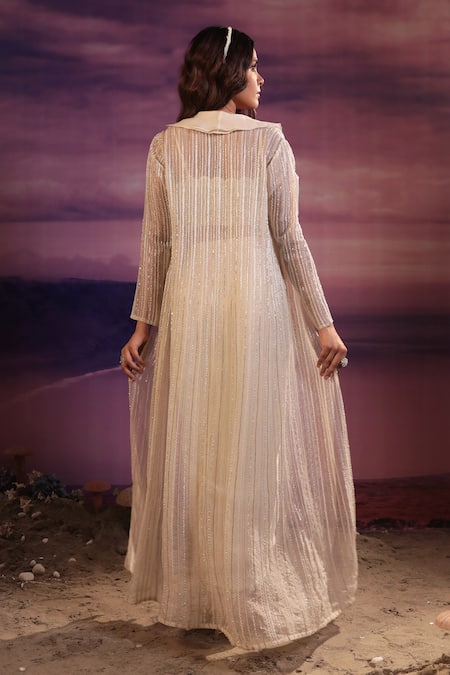 Shop_COUTURE BY NIHARIKA_Ivory Net, Satin, Organza Embroidery, Cut Work Stripe Jacket Draped Skirt Set _at_Aza_Fashions