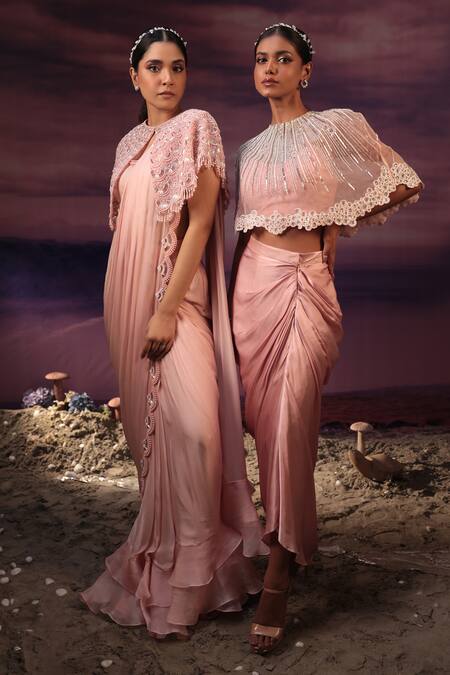 Shop COUTURE BY NIHARIKA Pink Satin Embroidery Round Neck Geometric Line Cape Draped Skirt Set Online at Aza Fashions Shop_COUTURE BY NIHARIKA_Pink Satin Embroidery Round Neck Geometric Line Cape Draped Skirt Set _Online_at_Aza_Fashions
