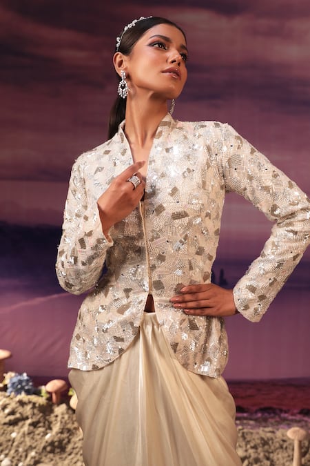 Shop COUTURE BY NIHARIKA Ivory Organza, Satin Sequins, Geometric Embroidered Jacket And Draped Skirt Set at Aza Fashions Shop_COUTURE BY NIHARIKA_Ivory Organza, Satin Sequins, Geometric Embroidered Jacket And Draped Skirt Set _at_Aza_Fashions