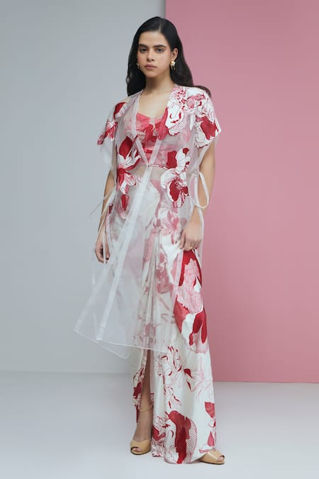 Studio Radical White Silk , Applique Sweetheart Neck Rafflesia Cape Skirt Set Online at Aza Fashions Studio Radical_White Silk , Applique Sweetheart Neck Rafflesia Cape Skirt Set _Online_at_Aza_Fashions