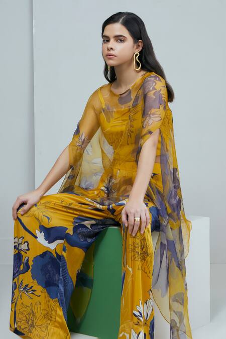 Buy_Studio Radical_Yellow Crepe, Organza, Silk Satin Boat Bloom Garden Print Cape Flared Pant Set _Online_at_Aza_Fashions