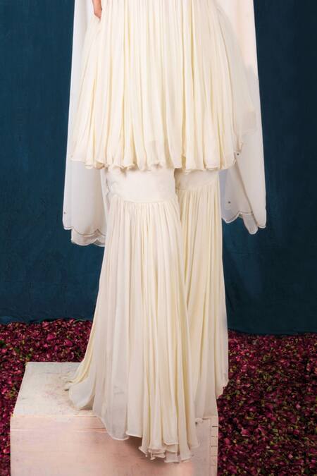 Saubhagya Off White Georgette, Linen Pearls, Floral Embroidered Peplum Kurta Sharara Set Online at Aza Fashions Saubhagya_Off White Georgette, Linen Pearls, Floral Embroidered Peplum Kurta Sharara Set _Online_at_Aza_Fashions