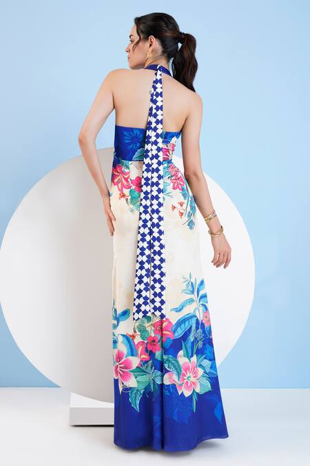 Shop_Mandira Wirk Resort_Blue Satin Halter Neck Floral Print Slit Dress _at_Aza_Fashions