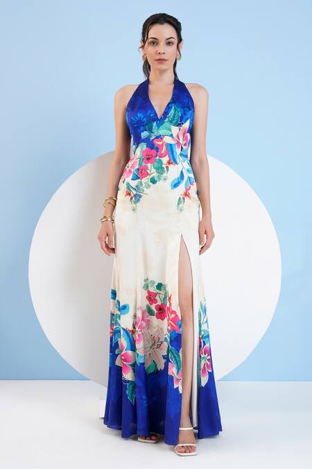 Shop_Mandira Wirk Resort_Blue Satin Halter Neck Floral Print Slit Dress _Online_at_Aza_Fashions