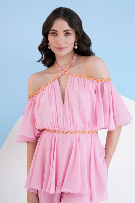 Shop_Mandira Wirk Resort_Pink Viscose, Georgette Beads Halter Neck Embellished Cold Shoulder Jumpsuit _Online_at_Aza_Fashions