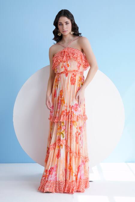 Mandira Wirk Resort_Orange Chiffon Fringe Halter Neck Floral Print Pleated Maxi Dress _Online_at_Aza_Fashions