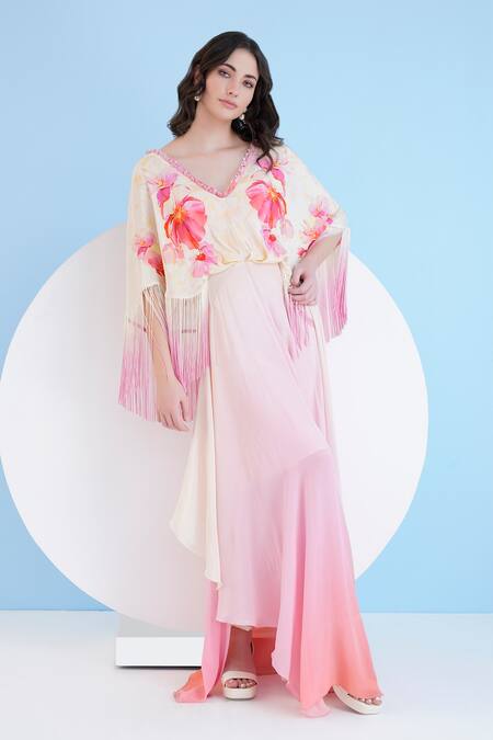 Shop Mandira Wirk Resort Peach Viscose, Crepe Pearls Plunge Neck Bauhinia Print Ombre Dress at Aza Fashions Shop_Mandira Wirk Resort_Peach Viscose, Crepe Pearls Plunge Neck Bauhinia Print Ombre Dress _at_Aza_Fashions