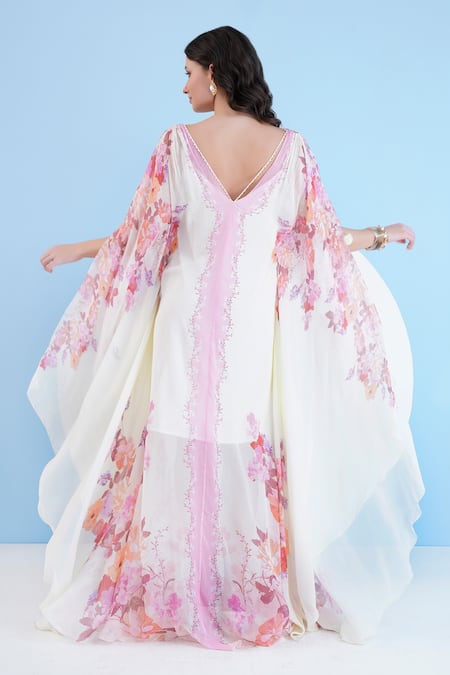 Shop Mandira Wirk Resort Ivory Chiffon Embroidery, Pearls Plunge Neck Embellished Floral Print Kaftan at Aza Fashions Shop_Mandira Wirk Resort_Ivory Chiffon Embroidery, Pearls Plunge Neck Embellished Floral Print Kaftan _at_Aza_Fashions