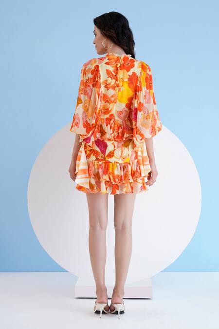 Shop_Mandira Wirk Resort_Orange Chiffon Ruffles V-neck Orchid Print Dress _at_Aza_Fashions