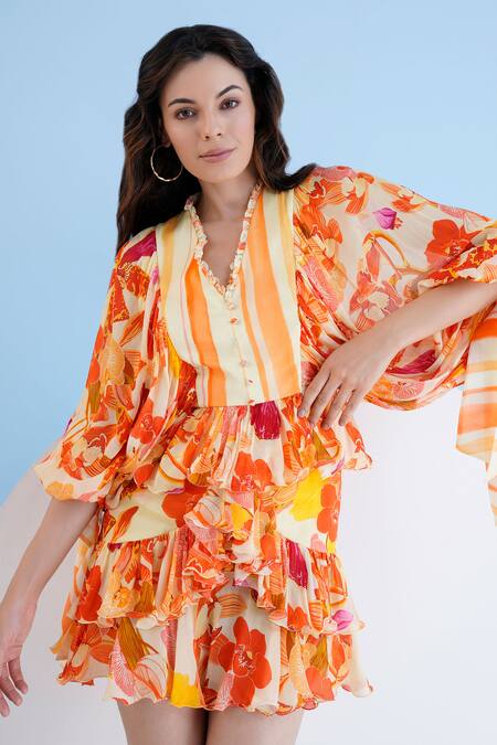 Shop_Mandira Wirk Resort_Orange Chiffon Ruffles V-neck Orchid Print Dress _Online_at_Aza_Fashions