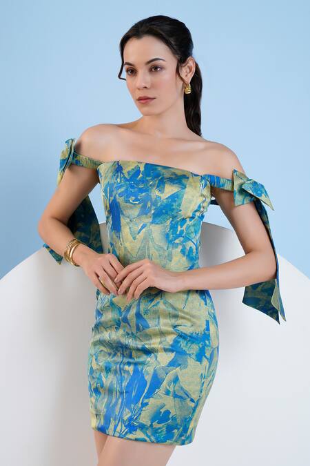 Shop Mandira Wirk Resort Blue Satin Bows Off-shoulder Botanical Foliage Print Short Dress Online at Aza Fashions Shop_Mandira Wirk Resort_Blue Satin Bows Off-shoulder Botanical Foliage Print Short Dress _Online_at_Aza_Fashions