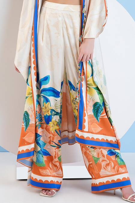 Buy_Mandira Wirk Resort_Ivory Satin Embroidery Scoop Neck Floral Print Cape And Bustier Pant Set _Online_at_Aza_Fashions