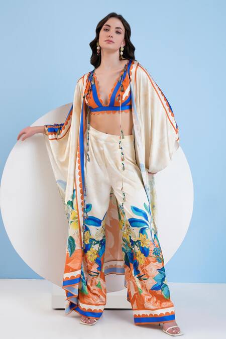 Shop_Mandira Wirk Resort_Ivory Satin Embroidery Scoop Neck Floral Print Cape And Bustier Pant Set _Online_at_Aza_Fashions