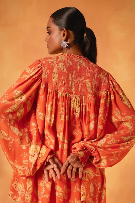 Shop_Saundh_Orange Crepe Tassels Open Neck, Round Serenade Abstract Print Jacket Sharara Set _at_Aza_Fashions